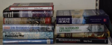 Eleven military books including Regiments of Waterloo by Rene North, A Near Run Thing by David