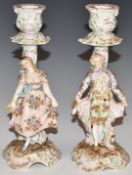 Pair of Continental porcelain figural candlesticks, H19.5cm