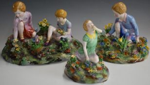 Three Crown Staffordshire figures of children picking flowers, largest W24 x H17cm