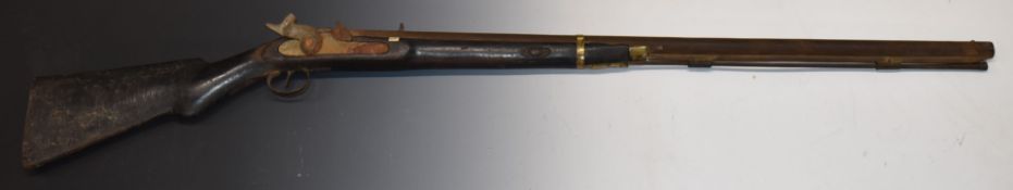 Enfield pattern percussion hammer action gun with semi-pistol grip, brass butt plate and barrel