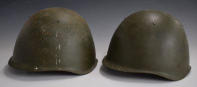Two Russian steel helmets, one stamped 268511, the other 213122, both with liner and chinstrap