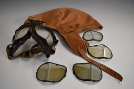 Pair of WW2 Mark IV flying goggles together with various extra lenses and a flying hat with label