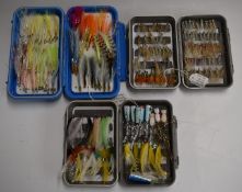 Three fly fishing boxes with saltwater streamers, poppers, shrimp flies, beaded flies etc