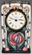 Moorcroft mantel clock decorated in the Mackintosh pattern, dated 95, H16cm