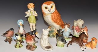 Beswick Beatrix Potter and bird figures, Royal Worcester Wednesday's Child and Pekingese, Goss cat