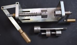 Steel and brass shotgun cartridge rollover tool for 4, 8 and 10 bore cartridges.
