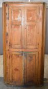 19thC panelled pine four door corner cupboard with shelved interior, W102 x H210cm