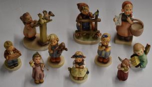 Ten Hummel Goebel figures including 'Signs of Spring', 'Monkey Business' and 'Love Petals'