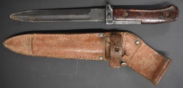 Czechoslovakian M1958 bayonet with grips of woodchip and protruding guard and tang, 17cm fullered