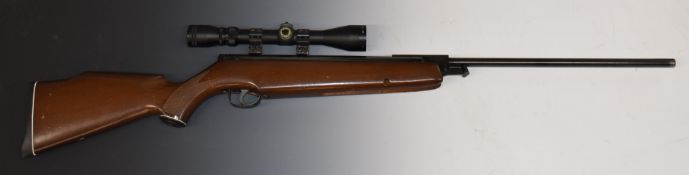 Webley Omega .177 air rifle with chequered semi-pistol grip, raised cheek piece to the stock and