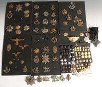 A collection of over 50 military badges and buttons etc including Irish Guards valise badge, 20th