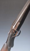 Belgian 12 bore side by side shotgun with shaped locks, chequered semi-pistol grip and forend,