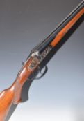 Denton & Kennell 20 bore side by side shotgun with engraved scenes of dogs to the locks, engraved