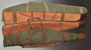 Four padded and wool lined shotgun or rifle slips including Buffalo River.