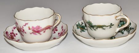 Two Meissen cups and saucers decorated with green and puce dragons, H6cm