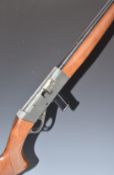Anschutz Model 525 .22 semi-automatic rifle with chequered semi-pistol grip, extended magazine,