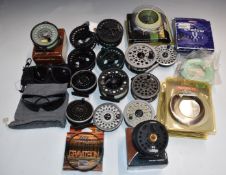 A large collection of trout fishing fly reels, lines and sunglasses including Okuma, together with a