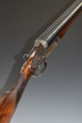 AYA No.2 sidelock side by side ejector shotgun with all over scrolling engraving, chequered grip and