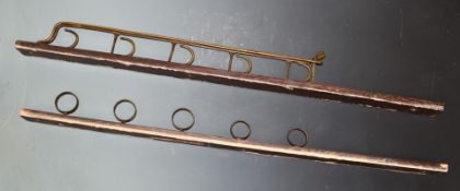 Edwardian oak and brass two part wall mountable gun rack for five guns with miniature brass