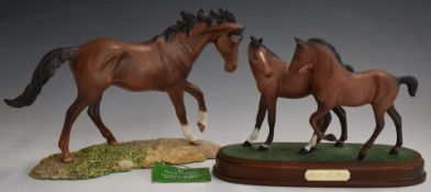 Two Royal Doulton horses