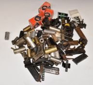 A collection of gun parts and accessories including magazines, Parker-Hale Roll-Off scope mounts,
