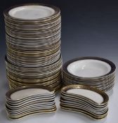 Approximately 95 pieces of Wedgwood and Co dinnerware decorated with a cobalt blue and gilt
