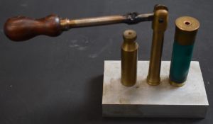 10 bore shotgun cartridge capper and decapper with turned wooden handle.