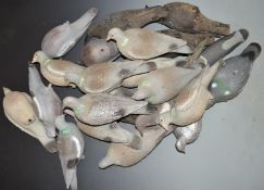 A large collection of pigeon and crow decoys including one battery operated example with motorised