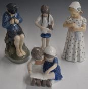 Four Copenhagen child figures, tallest 19cm