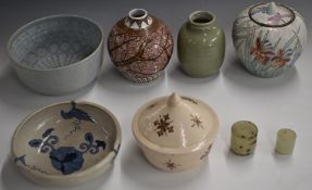 A collection of studio pottery including Japanese, celadon glazed vase, signed pieces, Chinese