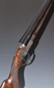 Stephen Grant & Sons 12 bore sidelock side by side ejector shotgun with named and engraved locks,