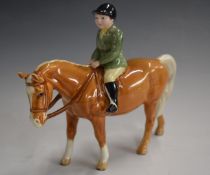 Beswick boy on palomino pony, H15cm