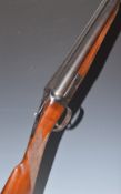 BSA 100 12 bore side by side shotgun with chequered grip and forend, single trigger, sling