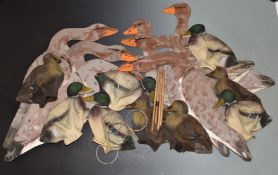 Sixteen shooting decoys comprising nine Sport Plast rubber floating mallard with metal weighting