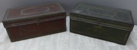 Two metal bound twin handled trunks with studwork decoration and lined interiors, possible