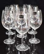 A set of eight Dartington F200/35 red wine glasses, new with stickers in original box, 23cm tall.