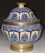 An 18th/19thC Islamic Hispano Moresque twin handled pedestal covered vessel with metal mounts, on