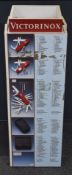 Victorinox rotating shop display advertising cabinet, each side displaying models and specifications