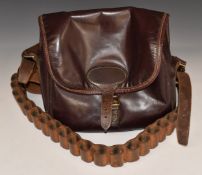 Jeffries brown leather shotgun cartridge bag together with a shotgun cartridge belt.