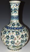 A 19th/20thC Persian / Iznik pedestal vase, 31cm