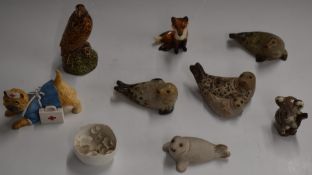 Beswick eagle and fox, together with four Cornish Pottery seals etc