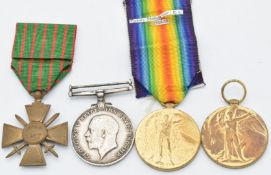 Four WW1 medals comprising War Medal named to 5970 A Cox, Leading Stoker, Royal Navy, Victory