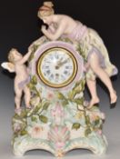 Volkstedt figural German mantel clock featuring lady and cherub, the Roman and Arabic dial enamel