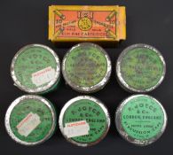 Six F Joyce & Co percussion cap tins with paper labels together with an empty ICI rim fire cartridge