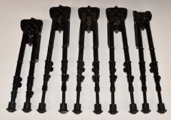 Five large adjustable folding rifle bi-pods.