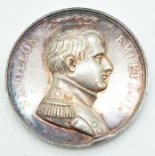 A white metal Napoleon coin / medal by Denon, with profile of Annibal verso, diameter 4cm