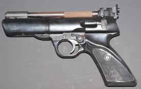Webley Tempest .22 air pistol with shaped and chequered grip and adjustable sights, NVSN.