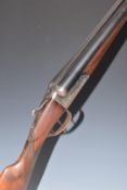 AYA 12 bore side by side shotgun with chequered grip and forend, double trigger and named 28 inch
