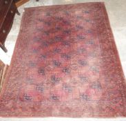 Turkoman rug with red ground W225 x L280cm