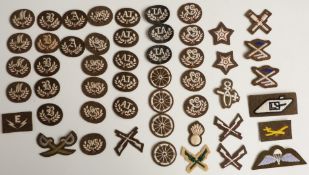 Approximately fifty British Army trade / qualification cloth badges including marksman, physical
